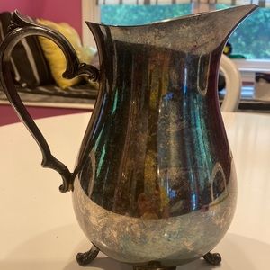 Silver Plated Water Pitcher. Needs to be polished. No dents 9”high.